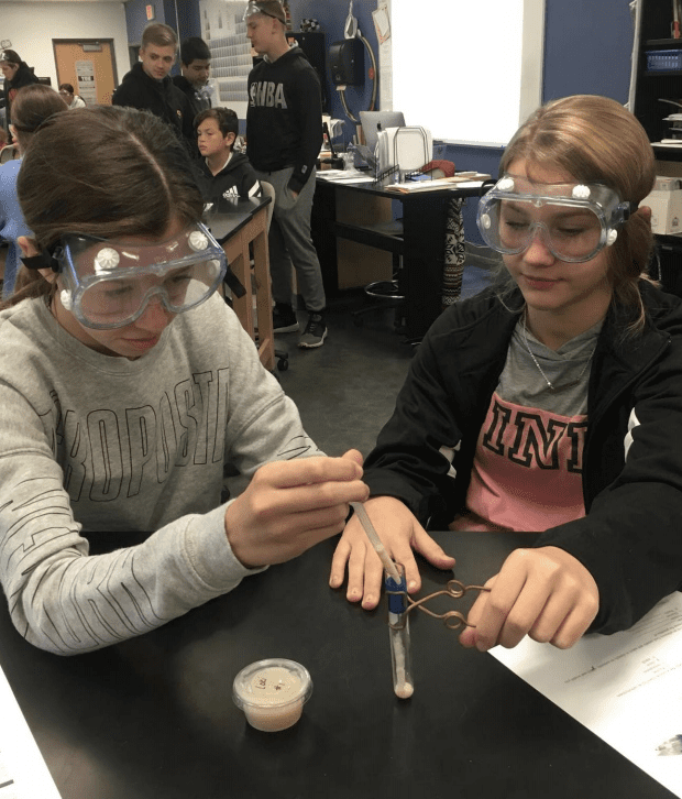 High school students working in a science lab.